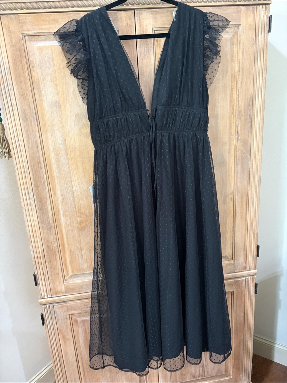 Lulu's Black Swiss Dot Deep V Midi Dress with Ruffle Cap Sleeves